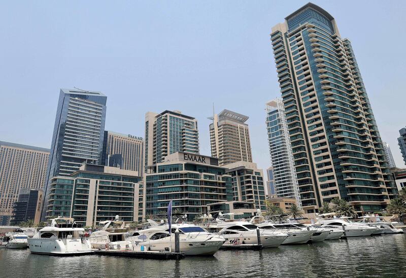 Luxury yachts are moored at the Dubai Marina Beach in the Gulf emirate, on June 10 2021.
 Dubai earned a reputation for delivering luxury for those with cash to splash years ago, but amid the Covid-19 pandemic, a new mode of travel has become popular, yachts.
Charter companies said they have seen an increased interest in yachting after coronavirus measures eased, especially among those who want to spend time with friends and family. / AFP / Karim SAHIB
