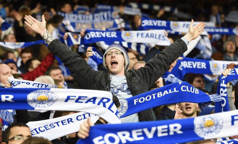 Leicester City fans cheer for their team during the Premier League match between Crystal Palace and Leicester City at Sellhurst Park in London, Britain, 19 March 2016. Leicester won 1-0. EPA/FACUNDO ARRIZABALAGA