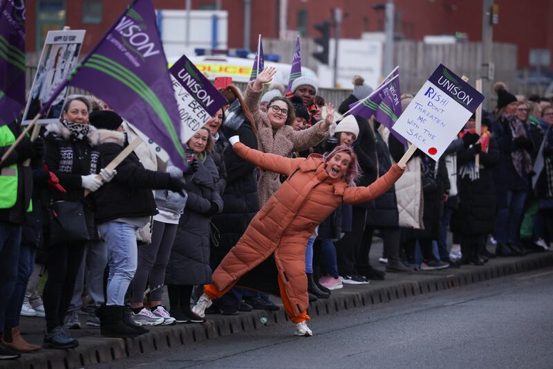 People take part in a strike outside Aintree University Hospital in Liverpool. Reuters