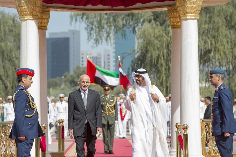 Sheikh Mohammed bin Zayed, the Crown Prince of Abu Dhabi and Deputy Supreme Commander of the Armed Forces, welcomes the president of Afghanistan, Ashraf Ghani, to Mushrif Palace in Abu Dhabi. Ryan Carter / Crown Prince Court  Abu Dhabi