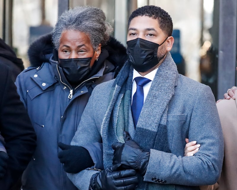 US actor Jussie Smollett (R) leaves the Leighton Criminal Courthouse with his family as the jury begins to deliberate in his trial for reportedly staging an attack on himself in Chicago, Illinois, USA, 08 December 2021.  According to prosecutors Smollett faces charges of felony disorderly conduct for lying to Chicago police that he was the victim of a hate crime early on 29 January 2019.  If convicted he faces up to three years in prison for staging an attack by two Nigerian brothers.   EPA / TANNEN MAURY