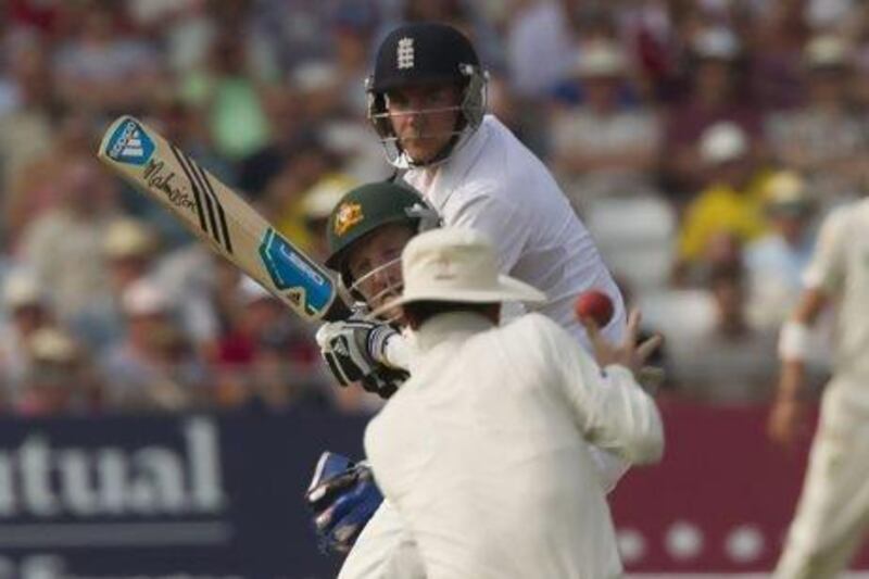 England's Stuart Broad, top, nicked a catch to Michael Clarke at first slip but stood his ground. Jon Super / AP Photo
