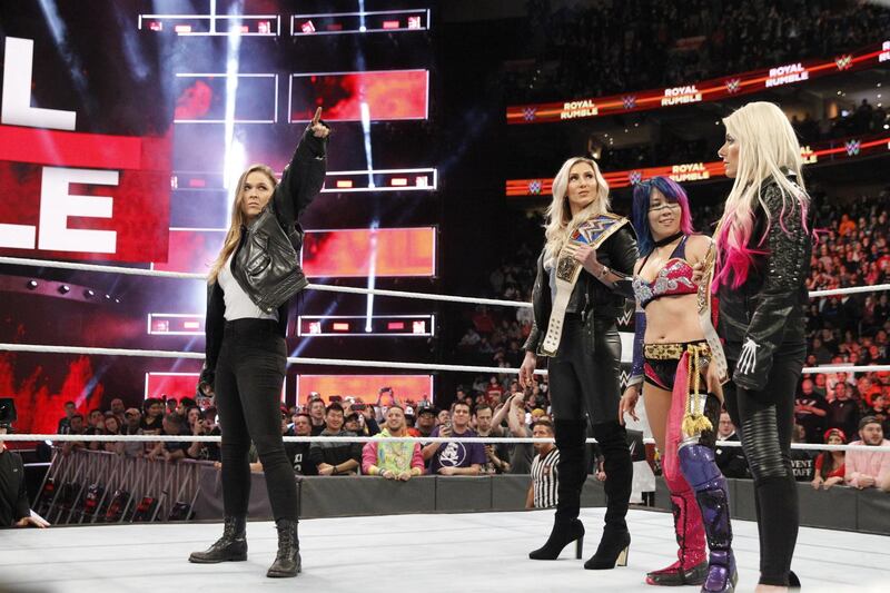 Ronda Rousey, left, will make her first WWE appearance since the Royal Rumble at Elimination Chamber on February 25 when the make-up of the women's title matches at WrestleMania 34 and who will be facing who should become a lot clearer. Image courtesy of WWE.