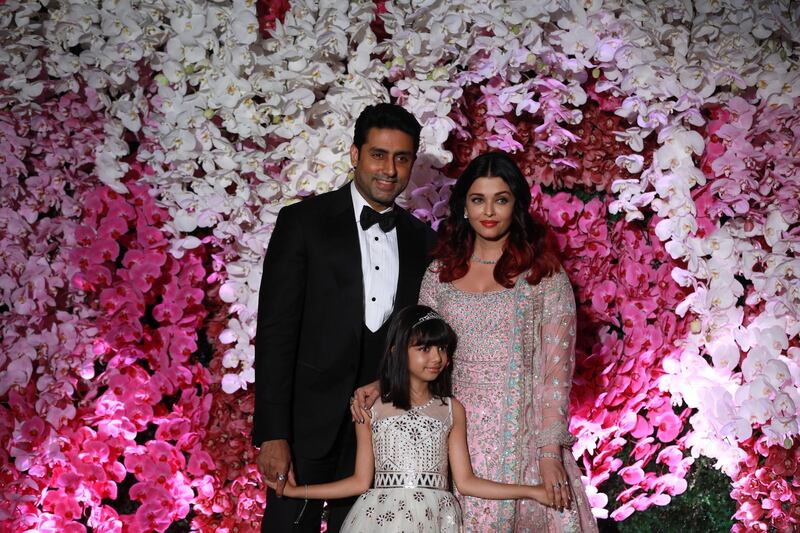 Abhishek Bachchan (L) and his wife Aishwarya Rai Bachchan with their daughter Aaradhya. Photo: EPA