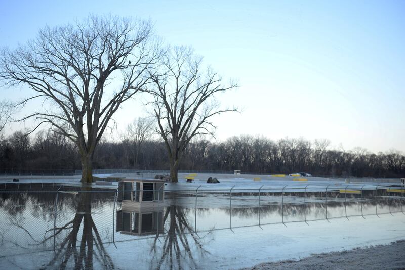 FILE PHOTO: One of many areas near the southeast side of Offutt Air Force Base affected by flood waters is seen in Nebraska, U.S., March 16, 2019. Picture taken March 16, 2019.  Courtesy Rachelle Blake/U.S. Air Force/Handout via REUTERS   ATTENTION EDITORS - THIS IMAGE HAS BEEN SUPPLIED BY A THIRD PARTY./File Photo