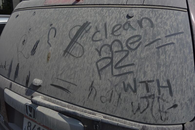 ABU DHABI, UNITED ARAB EMIRATES - - -  September 29, 2016 ---  A Honda Pilot covered in dirt and slapped with tickets sit in a parking lot near the Al Munda Primary School in Abu Dhabi. Some residents are being fined and their cars being towed away for as a result of dirty and or abandoned cars being left in parking lots around Abu Dhabi.   ( DELORES JOHNSON / The National )  
ID: 86356
Reporter: Anwar
Section: NA *** Local Caption ***  DJ-290916-Abandoned Cars-86356-008.jpg