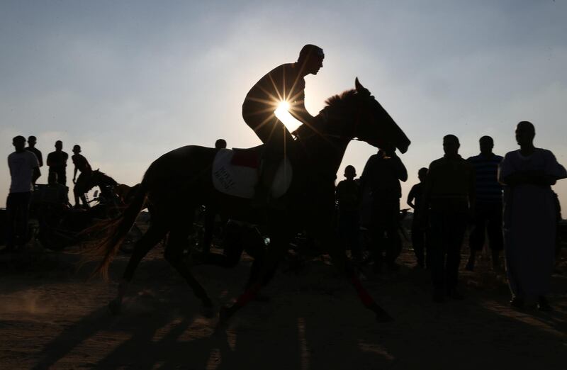 A man competes in a horse race in Rafah, southern Gaza Strip.  Reuters