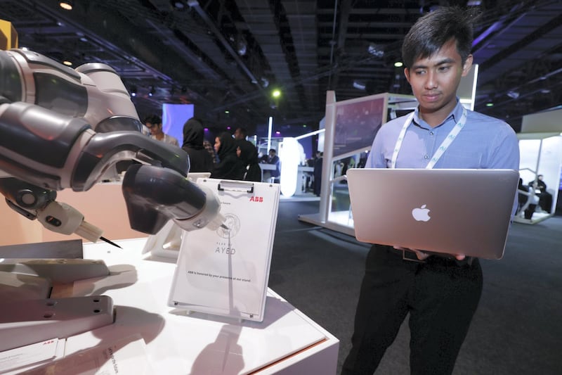 Dubai, April 30, 2019.  Ai Everything show at the Dubai World Trade Centre. --  The Yumie IRB 1400 Collaborative Robot drawing H.E. Sheikh Zayed.
Victor Besa/The National
Section:  NA
Reporter:  P. Ryan and A. Sharma