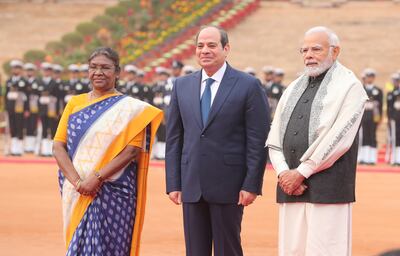 (From left) Indian President Droupadi Murmu, Egyptian President Abdel Fattah El Sisi and Indian Prime Minister Narendra Modi stand during a ceremonial reception for Mr El Sisi at the Presidential House in New Delhi on 25 January 2023. EPA