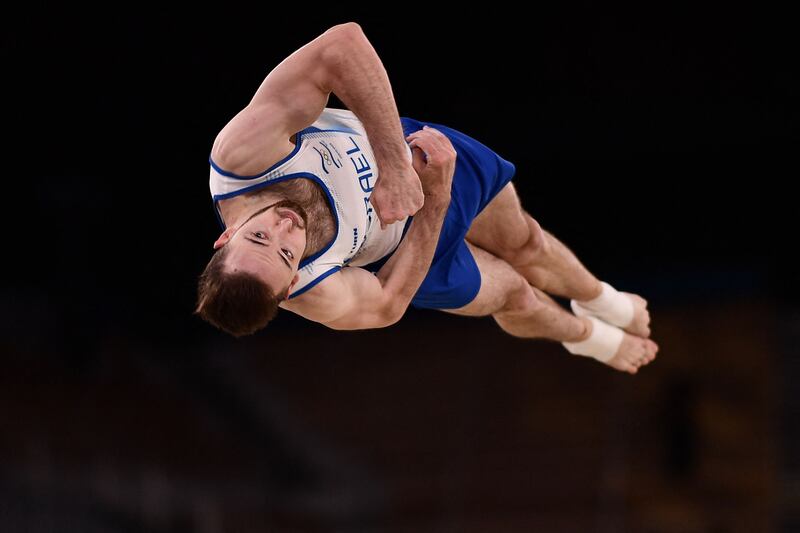 Israel's Artem Dolgopyat wins gold in the men's floor exercise.