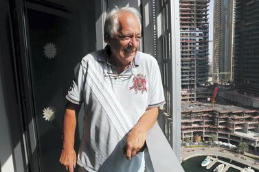 Retiree John Felton was one of the first residents to move into Palm Jumeirah in 2006. He has since relocated to his current home in Dubai Marina's Cayan Tower. Pawan Singh / The National