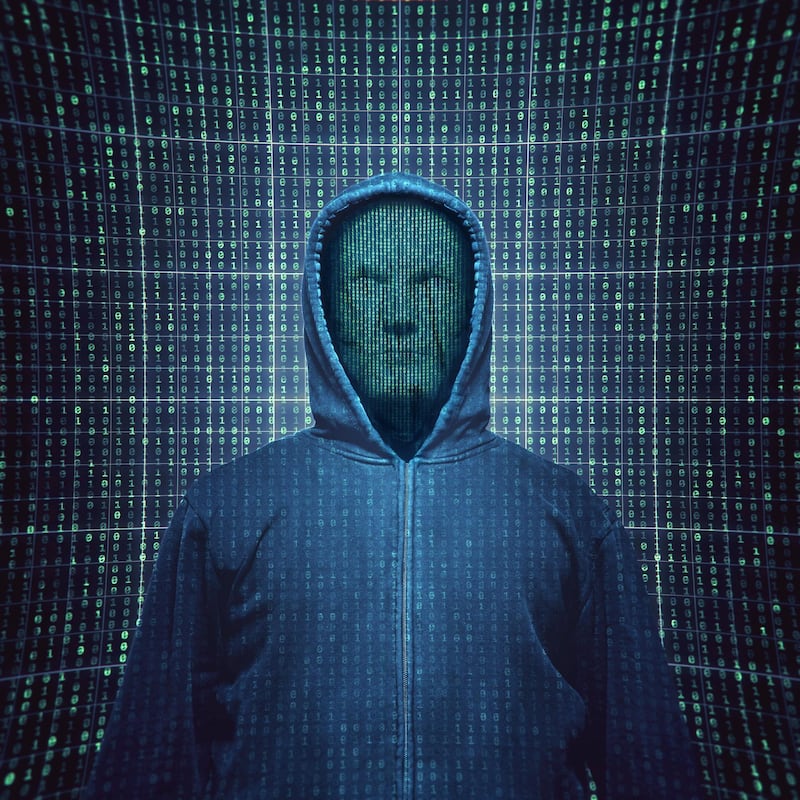 Digital faced man with the hoodie in the futuristic virtual environment.