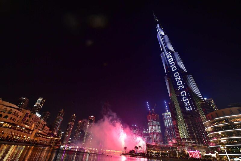 Dubai's Burj Khalifa, the world’s tallest building is illuminated during festivities marking the one-year countdown to Expo 2020, on October 20, 2019. Fireworks exploded over the glitzy Dubai skyline today, marking the one-year countdown to Expo 2020, with the city's rulers hoping the big-budget global trade fair will end with a bang, not a fizzle. / AFP / Giuseppe CACACE
