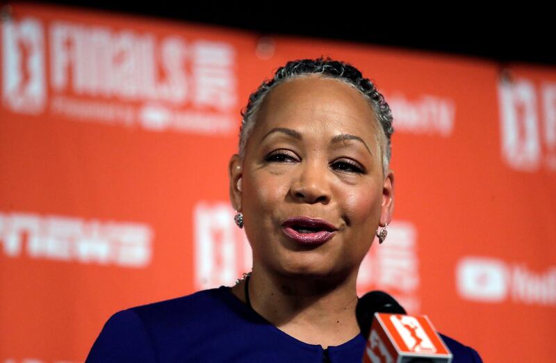 FILE - In this Sept. 7, 2018, file photo, then WNBA president Lisa Borders addresses media members before Game 1 of the WNBA basketball finals between the Seattle Storm and the Washington Mystics in Seattle. Borders, former president of the WNBA, who was named the head of Time's Up last year, says she has resigned as president and CEO of Time's Up, the gender equality initiative formed in 2018 in response to sexual misconduct allegations in Hollywood. Borders says in statement Monday, Feb. 18, 2019, that she is stepping aside "with deep regret" due to family issues. (AP Photo/Elaine Thompson, File)