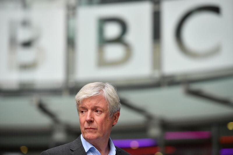 (FILES) In this file photo taken on November 15, 2018 the  Director-General of the BBC Tony Hall is seen waiting to greet Britain's Prince William, Duke of Cambridge, and Britain's Catherine, Duchess of Cambridge, as the royal couple visit BBC Broadcasting House in London, to view the work the broadcaster is doing as a member of The Duke's Taskforce on the Prevention of Cyberbullying.  Tony Hall, the former BBC chief who was criticised for his "woefully ineffective" probe into Martin Bashir's deception in securing a bombshell interview with Princess Diana, resigned on May 22, 2021, as chair of Britain's National Gallery.
 / AFP / POOL / Ben STANSALL
