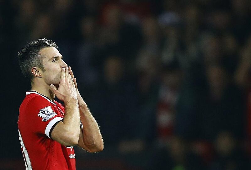 Manchester United’s Robin van Persie celebrates his goal against Hull City during their English Premier League soccer match at Old Trafford in Manchester, northern England, November 29, 2014. REUTERS/Darren Staples