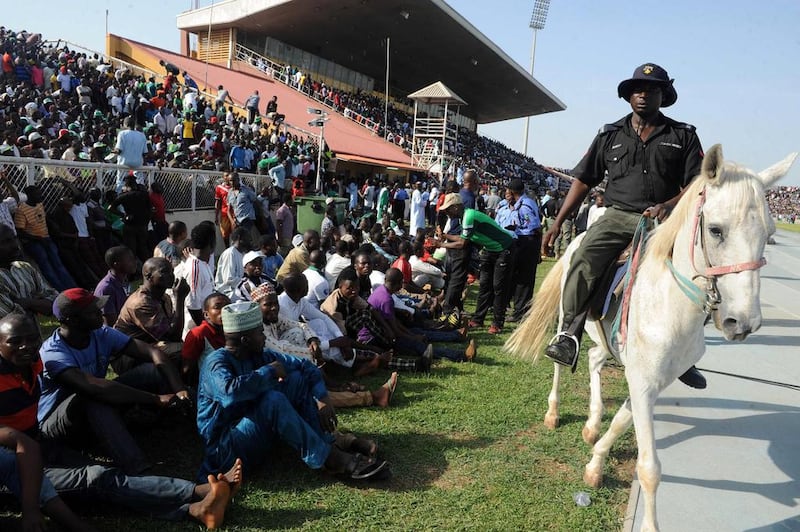A policeman rides a horse as he patrols during the African Cup of Nations qualification match between Egypt and Nigeria, on March 25, 2016, in Kaduna. AFP / PIUS UTOMI EKPEI