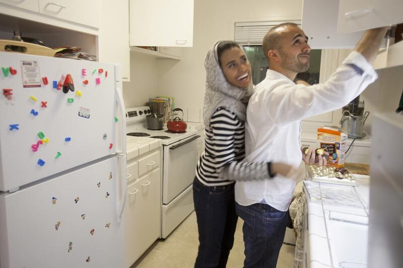 Khalid Al Ameri with his wife Salama, who live in the US, say that being away from the UAE has helped them to understand more about the UAE. Peter DaSilva / The National



