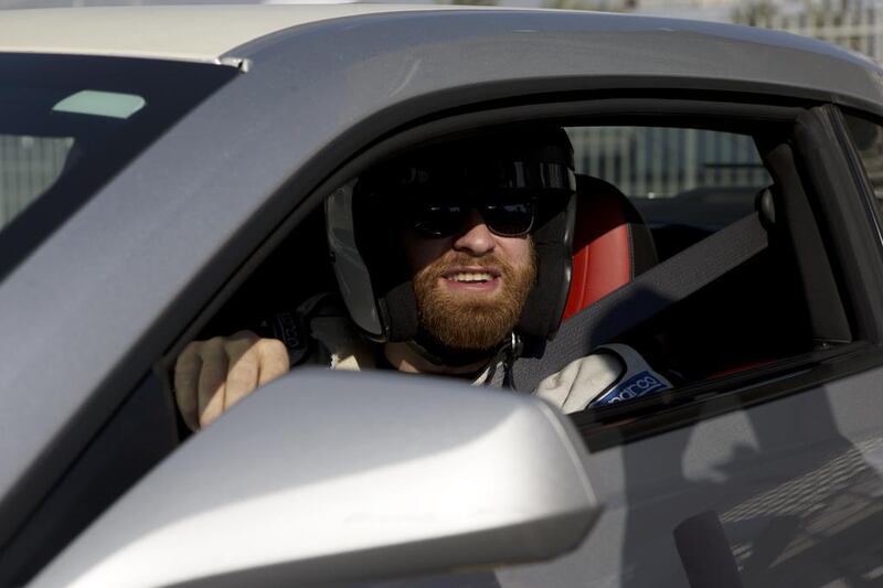 WWE wrestler Sami Zayn shown before driving down the drag strip at Yas Marina Circuit in Abu Dhabi on Wednesday. Christopher Pike / The National