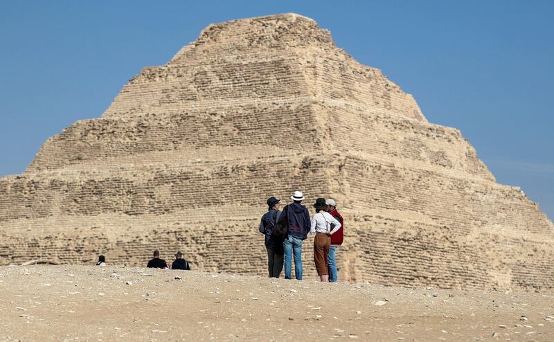 Visitors view the step pyramid of Djoser in Egypt's Saqqara necropolis, south of the capital Cairo.  AFP