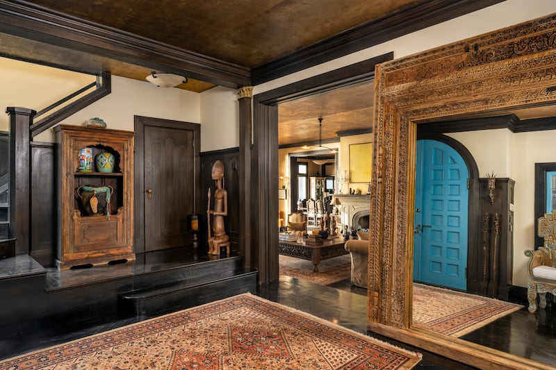 Formal living and dining rooms connect to more casual, intimate spaces. Photo: TopTenRealEstateDeals.com
