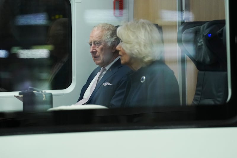 King Charles and Queen Consort Camilla on board the train to Hamburg. Getty Images
