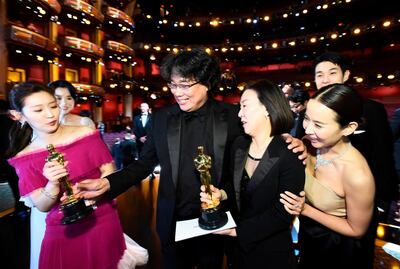 TOPSHOT - In this handout photo provided by A.M.P.A.S. Best Picture Award winners for "Parasite" pose onstage during the 92nd Annual Academy Awards at the Dolby Theatre on February 09, 2020 in Hollywood, California. RESTRICTED TO EDITORIAL USE - MANDATORY CREDIT "AFP PHOTO / AMPAS/ Matt Petit" - NO MARKETING - NO ADVERTISING CAMPAIGNS - DISTRIBUTED AS A SERVICE TO CLIENTS
 / AFP / AMPAS / AMPAS / Matt Petit / RESTRICTED TO EDITORIAL USE - MANDATORY CREDIT "AFP PHOTO / AMPAS/ Matt Petit" - NO MARKETING - NO ADVERTISING CAMPAIGNS - DISTRIBUTED AS A SERVICE TO CLIENTS
