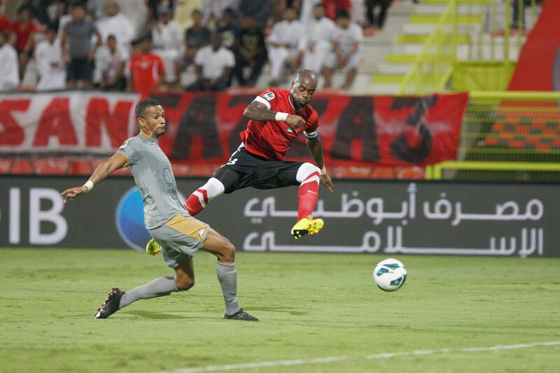 Dubai, United Arab Emirates, Oct 21, 2012, Al Ahli v  Al Shabab, Al Rashid Stadium . Al Ahli's 23 Grafite shoots on goal during action at Al Rashid Stadium  Oct 21 2012. Mike Young / The National 