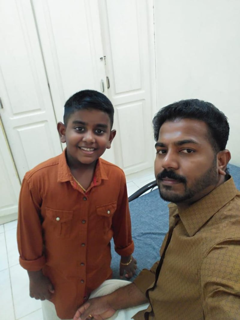 Renjith Somarajan (right) won Dh20 million from the Abu Dhabi Big Ticket draw. He said the money will help him support his son Niranjan (pictured) and his wife