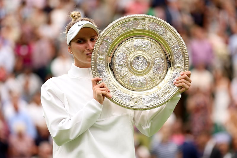Marketa Vondrousova with the Wimbledon trophy after her win over Ons Jabeur. Getty