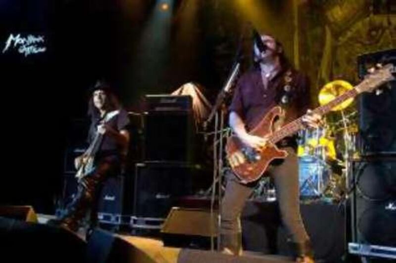 Phil Campbell guitarist, left, and Lemmy Kilmister, right, singer and bassist of British hard rock group Motorhead, perform on stage, during the 41th Montreux Jazz Festival at the Stravinski hall in Montreux, Switzerland, Saturday July 7, 2007. (AP Photo/KEYSTONE/Sandro Campardo)