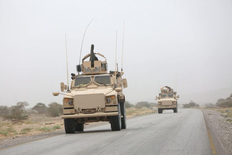 Armoured vehicles drive along a road during a fight against Houthi rebels in an area between Yemen’s northern provoices of Al Jawf and Marib on December 26, 2015. Ali Owidha / Reuters