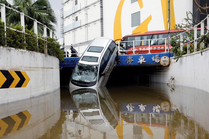 A vehicle damaged by Typhoon Hato is seen in Macau, China. Tyrone Siu / Reuters
