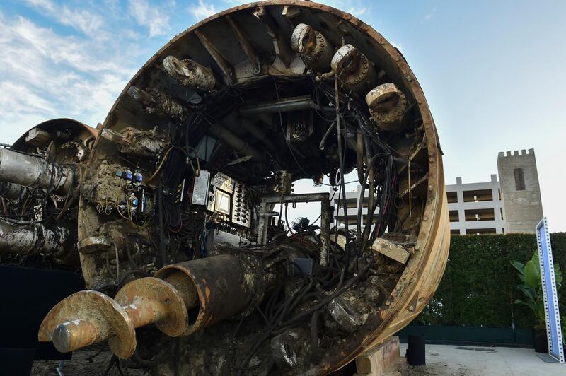 Tunnel boring equipment is displayed. AP Photo