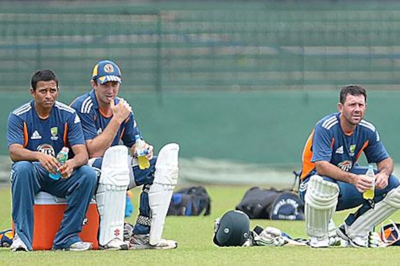 It was either Usman Khawaja, left, or Shaun Marsh, centre to make way for the return of Australia's former captain Ricky Ponting.