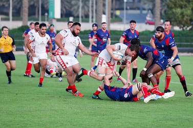 Action at the rugby game whereby Abu Dhabi Harlequins win 45-32 over Jebel Ali Dragons, at Zayed Sports City. Khushnum Bhandari/ The National