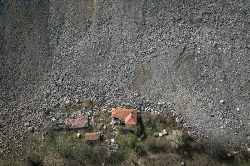 A destroyed house near an open-pit copper mine, run by a subsidiary of China's Zijin Mining, near Krivelj, Serbia. Reuters