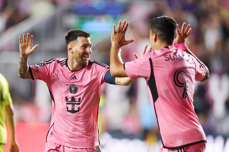 Mar 13, 2024; Fort Lauderdale, FL, USA;  Inter Miami CF forward Lionel Messi (10) celebrates after scoring a goal with forward Luis Suarez (9) against the Nashville SC in the first half during the Concacaf round of sixteen at Chase Stadium.  Mandatory Credit: Nathan Ray Seebeck-USA TODAY Sports