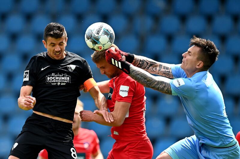 Anthony Losilla (L) of Bochum scores the opening goal during the German Bundesliga Second Division match between Bochum 1848 and Heidenheim at Vonovia Ruhrstadion in Bochum, Germany.  EPA