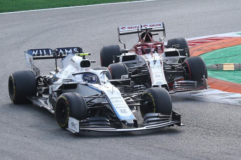 Williams driver Nicholas Latifi of Canada, left, and Alfa Romeo driver Kimi Raikkonen. AP