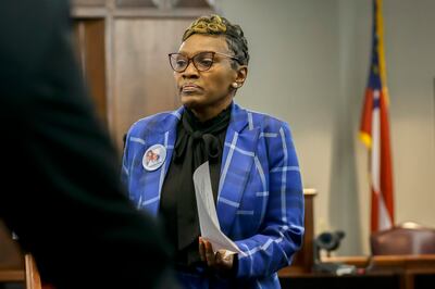 Ahmaud Arbery's mother, Wanda Cooper-Jones, leaves the podium after giving her impact statement to Superior Court Judge Timothy Walmsley during the sentencing of Greg McMichael and his son, Travis McMichael, and a neighbour, William "Roddie" Bryan in the Glynn County Courthouse, Georgia. AP