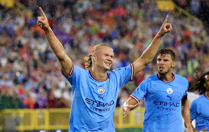 Erling Haaland celebrates after scoring Manchester City's first goal. AFP
