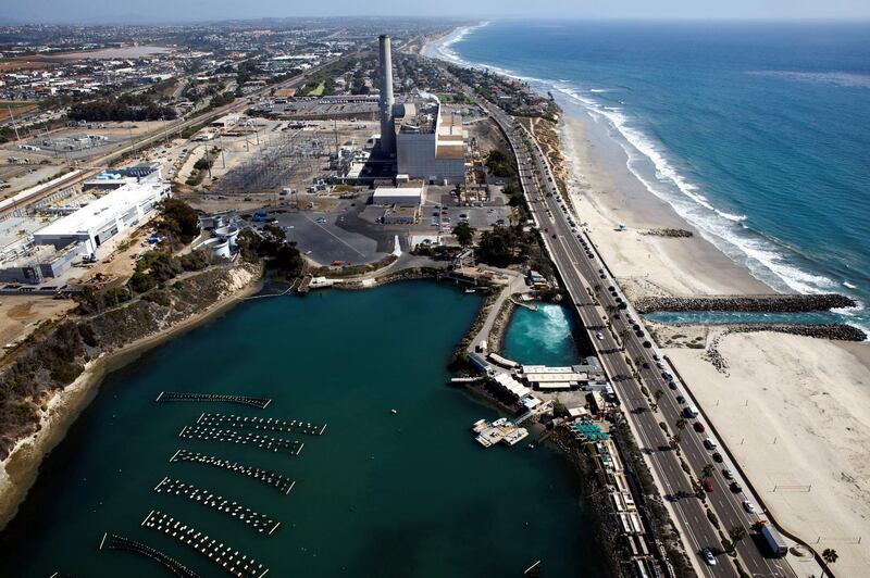 The Carlsbad Desalination plant stands under construction in this aerial photograph taken over Carlsbad, California, U.S., on Monday, Aug. 31, 2015. The $1 billion Carlsbad plant, which uses reverse osmosis to purify seawater, will have the capacity to produce 54 million gallons a day of drinkable water. Photographer: Patrick T. Fallon/Bloomberg via Getty Images
