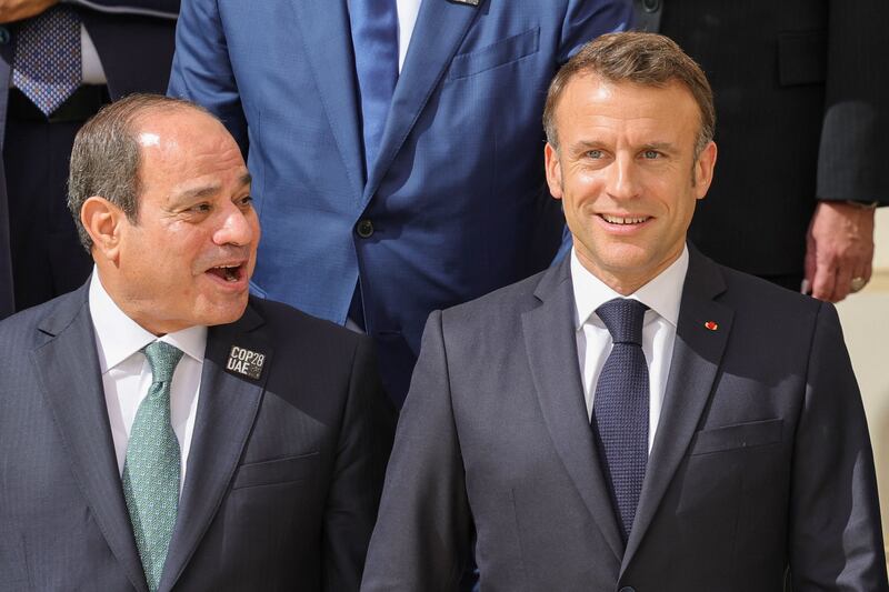 Egypt's President Abdel Fattah El Sisi, left, and French President Emmanuel Macron. AFP