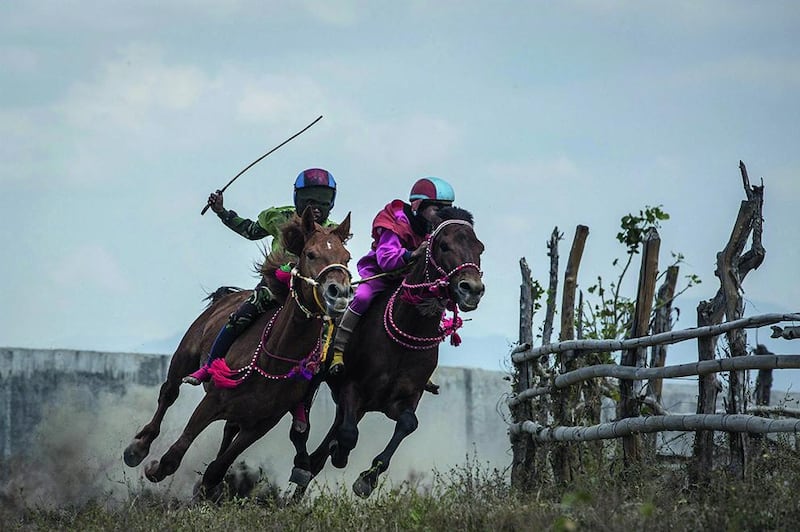 Child jockeys compete in the traditional horse racing of Indonesia’s Sumbawa Island. Ulet Ifansasti / Getty Images / Septemb 15, 2015