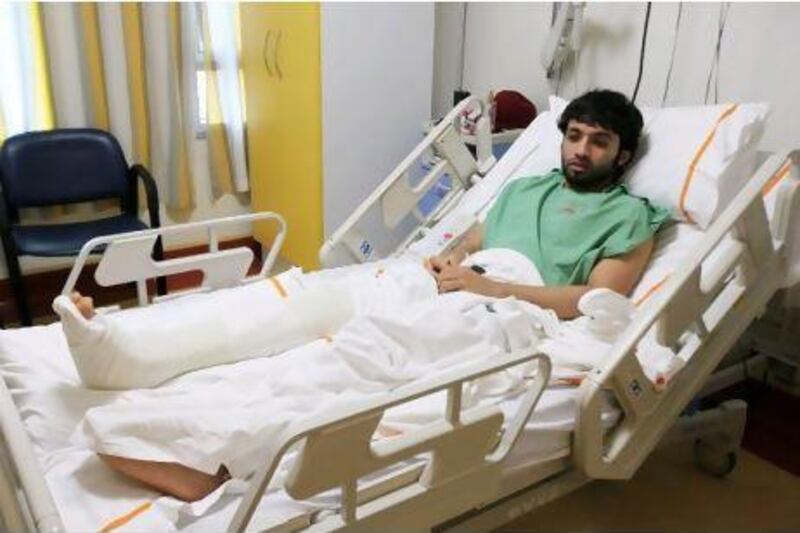 Mohammed Ibrahim is being treated for deep cuts,a dislocated knee and a head injury at Rashid Hospital after being attacked by a gang outside his home in Al Quoz three weeks ago.