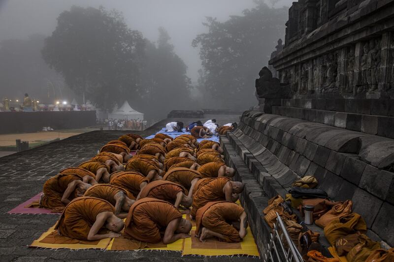 Buddhist monks pray at Borobudur temple during celebrations for Vesak Day in Magelang, Central Java, Indonesia. Getty