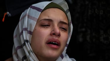 A Palestinian woman mourns victims of an Israeli strike in Rafah, southern Gaza, on Sunday. Getty Images.