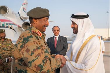 Sheikh Mohamed bin Zayed, Crown Prince of Abu Dhabi and Deputy Supreme Commander of the Armed Forces, welcomes General Abdel Fattah Al Burhan, upon his arrival at the Presidential Airport, on Sunday.    