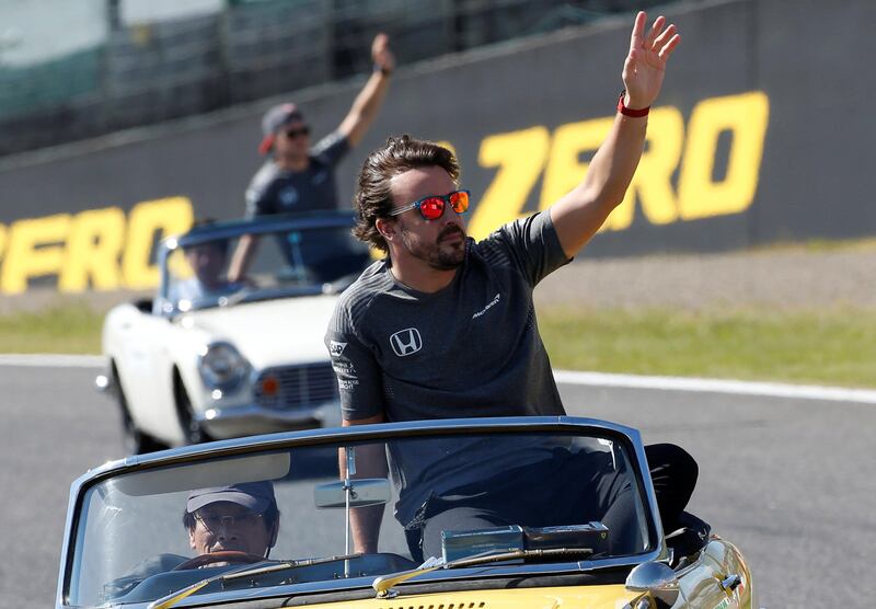 Formula One F1 - Japanese Grand Prix 2017 - Suzuka Circuit, Japan - October 8, 2017. McLaren's Fernando Alonso of Spain attends a drivers' parade before the start of the Japanese Grand Prix race. REUTERS/Toru Hanai